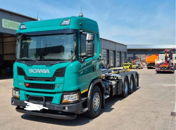 Scania G 560 XT 8x4 mit Palfinger-Abrollkipper, Bild 1